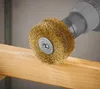 A wire brush attachment on a drill is shown in use on a wooden surface. Produktbild-Vorschau