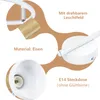 Close-up views of a white lamp with text overlays highlighting features and materials. Voir les images du produit