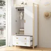 A white and wood-colored wardrobe with two doors and two drawers, shown open. Voir les images du produit