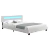 A white bed with a modern, minimalist design, featuring a headboard with integrated LED lighting. Two pillows and a gray throw are placed on the bed. Náhled obrázku produktu