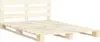 A wooden pallet bed frame with a headboard, shown against a white background. Náhľad obrázku produktu