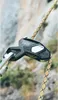 A climbing device attached to a rope, with a rocky, natural background. Náhľad obrázku produktu