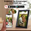 A hand holding a smartphone displaying a digital photo frame app, with a digital photo frame in the background displaying a couple. Produktbild-Vorschau