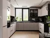A modern, U-shaped kitchen with light beige cabinets, black countertops, and a large window overlooking greenery. Produktbild-Vorschau