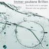 A pair of glasses being cleaned in water with bubbles and microscopic particles. Produktbild-Vorschau