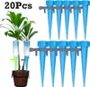 A product shot of automatic plant watering devices, with a few plants in a pot to demonstrate use. Produktbild-Vorschau