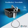 A black sink with a chrome faucet and a flexible hose, set against a blue and white gradient background. Anteprima dell’immagine prodotto