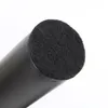 A close-up view of the end of a black cylindrical furniture leg with a black felt pad. Anteprima dell’immagine prodotto