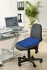 An office chair with a blue wedge cushion on it, next to a desk with a laptop. Produktbild-Vorschau