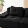 A close-up view of a black corduroy modular sofa with cushions. Produktbild-Vorschau
