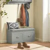 An entryway bench with storage, coats, a bag, and shoes. Náhľad obrázku produktu