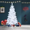 A white artificial Christmas tree is decorated with gifts and lights in a room. Produktbild-Vorschau