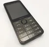 A close-up, angled view of a black Nokia feature phone on a white background. Podgląd zdjęcia produktu