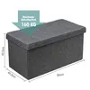 A dark gray storage ottoman with dimensions and weight capacity indicated. Anteprima dell’immagine prodotto