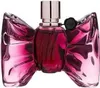 A perfume bottle with a bow-shaped design. Voir les images du produit