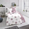 A bedroom scene with a bed made up with star-patterned bedding. Produktbild-Vorschau