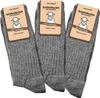 Three pairs of grey wool socks are displayed upright. Anteprima dell’immagine prodotto