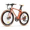 A studio shot of an orange electric bicycle against a white background. Produktbild-Vorschau