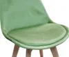 Close-up of a light green velvet chair seat and back. Produktbild-Vorschau