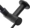 A close-up, studio shot of a black kitchen faucet mounted on a wall. Podgląd zdjęcia produktu