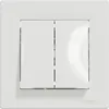 A white double light switch on a white background. Anteprima dell’immagine prodotto