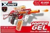 The image shows the packaging of a Zuru X-Shot Hyper Gel Trace Fire toy gun. Voir les images du produit