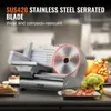 A VEVOR electric slicer is shown on a countertop with food items like meat, broccoli, and cake around it. Text overlays highlight product features. Náhled obrázku produktu