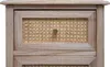 A close-up view of a wooden dresser drawer with a rattan insert and a gold knob. Podgląd zdjęcia produktu
