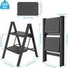 Diagrams and dimensions of a black stepladder. Voir les images du produit
