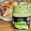 Pistaziencreme ohne Zuckerzusatz ohne Palmöl glutenfrei im offenen Glas cremige Textur Produktbild-Vorschau