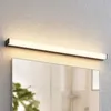 A linear LED light fixture mounted above a mirror. Produktbild-Vorschau