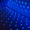 A net of blue LED lights is draped over a floor and up a wall, creating a decorative lighting effect. Produktbild-Vorschau