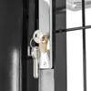 A close-up view of a gate lock with two keys inserted. Produktbild-Vorschau