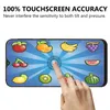 A hand is touching a smartphone screen displaying a fruit-themed game. The phone is shown in landscape mode, and the screen has a blue background with radiating lines. Various cartoon fruits are displayed on the screen, and a finger is interacting with a c Produktbild-Vorschau
