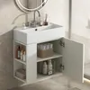 A white bathroom vanity with a sink and open cabinet doors, displaying various bathroom accessories. Voir les images du produit
