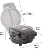 A black and gray omelette maker with measurement indicators. The lid is open, revealing the cooking plates. Produktbild-Vorschau