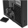 Close-up view of the back of an Xbox Series X console, showing a WD_BLACK expansion card plugged into a proprietary port. Produktbild-Vorschau