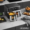 A modern kitchen counter with a dual-chamber air fryer and various food items. Produktbild-Vorschau