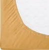 A close-up view of a fitted sheet on a mattress. Náhled obrázku produktu