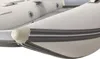 Close-up view of the front section of a white inflatable boat. Voir les images du produit