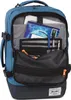 An open blue backpack with various items inside, including a laptop, notebook, and pens. Produktbild-Vorschau
