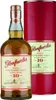A bottle of Glenfarclas Highland Single Malt Scotch Whisky and its presentation tube. Produktbild-Vorschau