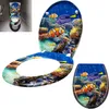 A toilet seat and lid with an underwater scene design, including clownfish and a tang fish, displayed on a white background. Náhled obrázku produktu