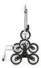A side view of a black and silver shopping trolley with multiple wheels, designed to climb stairs. Voir les images du produit