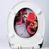 A white toilet seat with a floral design is shown against a light gray and white background. Produktbild-Vorschau