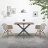 A dining set with a wooden table and two chairs in a minimalist room setting. Náhled obrázku produktu