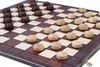 A close-up, angled view of a wooden checkers board with pieces set up for a game. Voir les images du produit