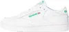 A side view of a white Reebok Club 85 sneaker with green accents. Produktbild-Vorschau