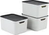 Three white storage boxes with black lids are stacked and arranged on a white background. Produktbild-Vorschau