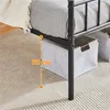 Close-up of a bed frame showing under-bed storage space with a measurement indicator. Podgląd zdjęcia produktu